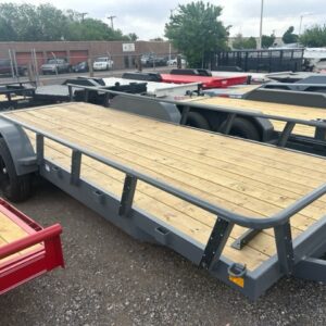 Flatbed utility trailer with rails